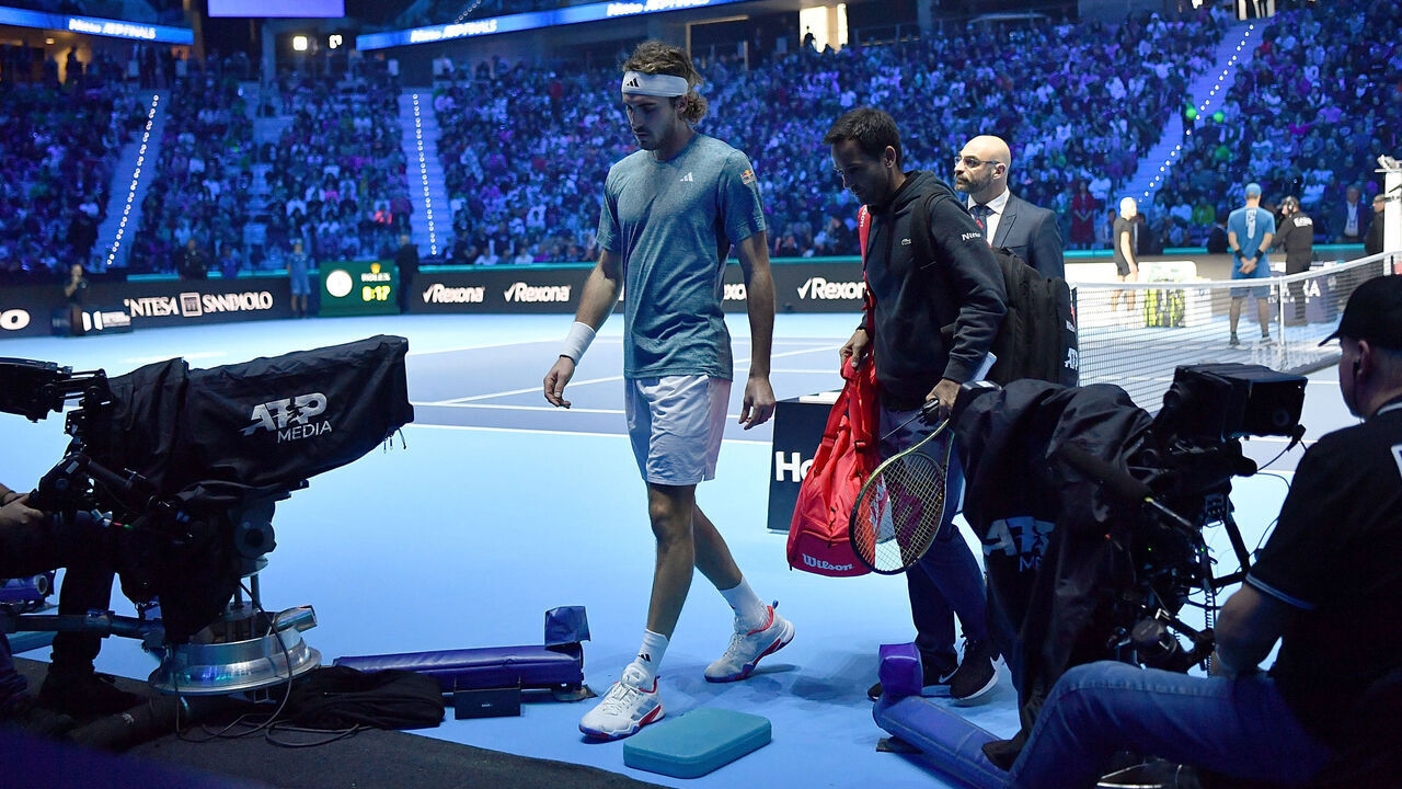 TURIN, ITALY - NOVEMBER 14: Stefanos Tsitsipas of Greece looks dejected after retiring in the Men's Singles Round Robin match against Holger Rune of Denmark on day three of the Nitto ATP Finals at Pala Alpitour on November 14, 2023 in Turin, Italy.