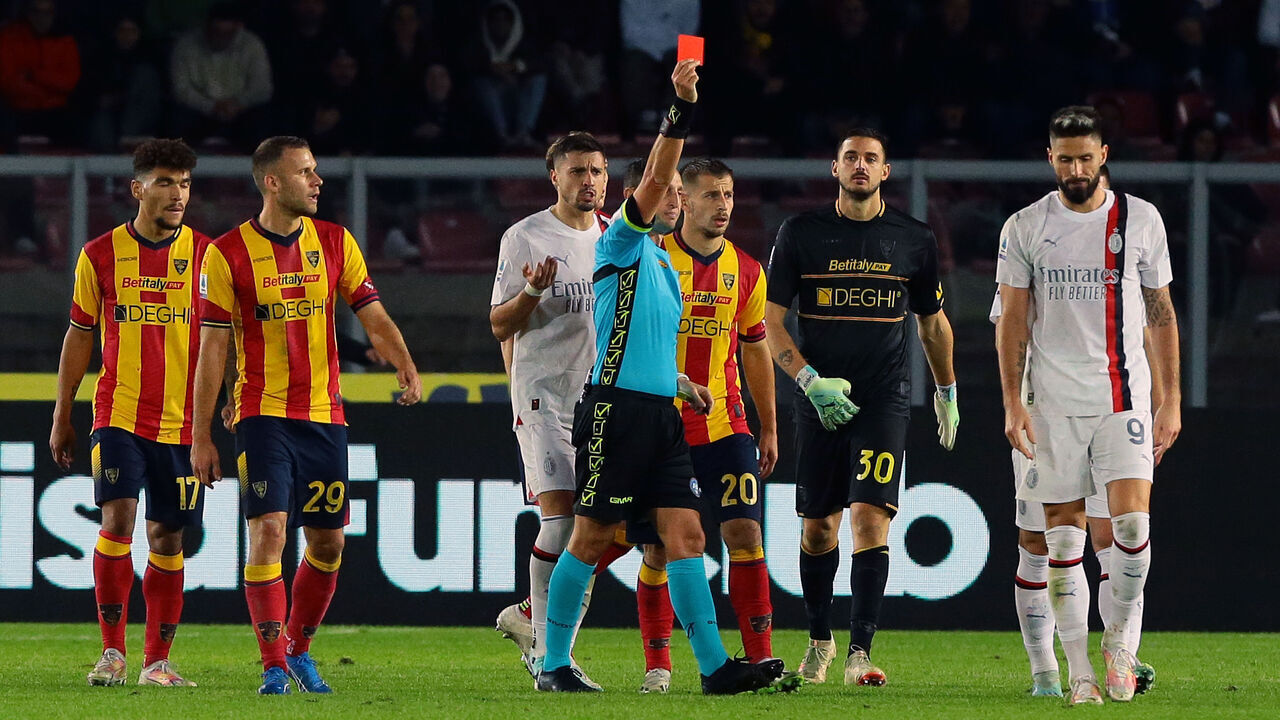 LECCE, ITALY - NOVEMBER 11: Olivier Giroud of AC Milan is sent off by the referee during the Serie A TIM match between US Lecce and AC Milan at Stadio Via del Mare on November 11, 2023 in Lecce, Italy.