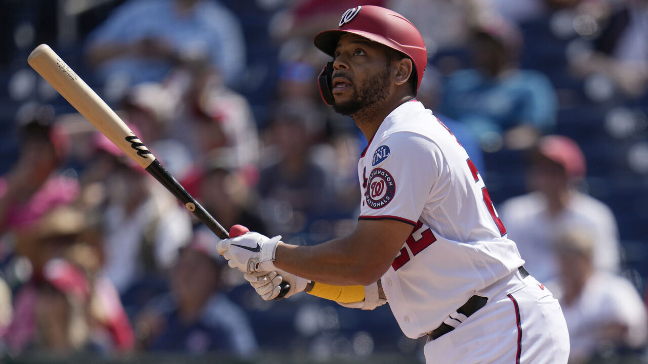 WASHINGTON, DC - SEPTEMBER 20: Dominic Smith #22 of the Washington Nationals watches his ball as he bats against the Chicago White Sox during the first inning at Nationals Park on September 20, 2023 in Washington, DC.