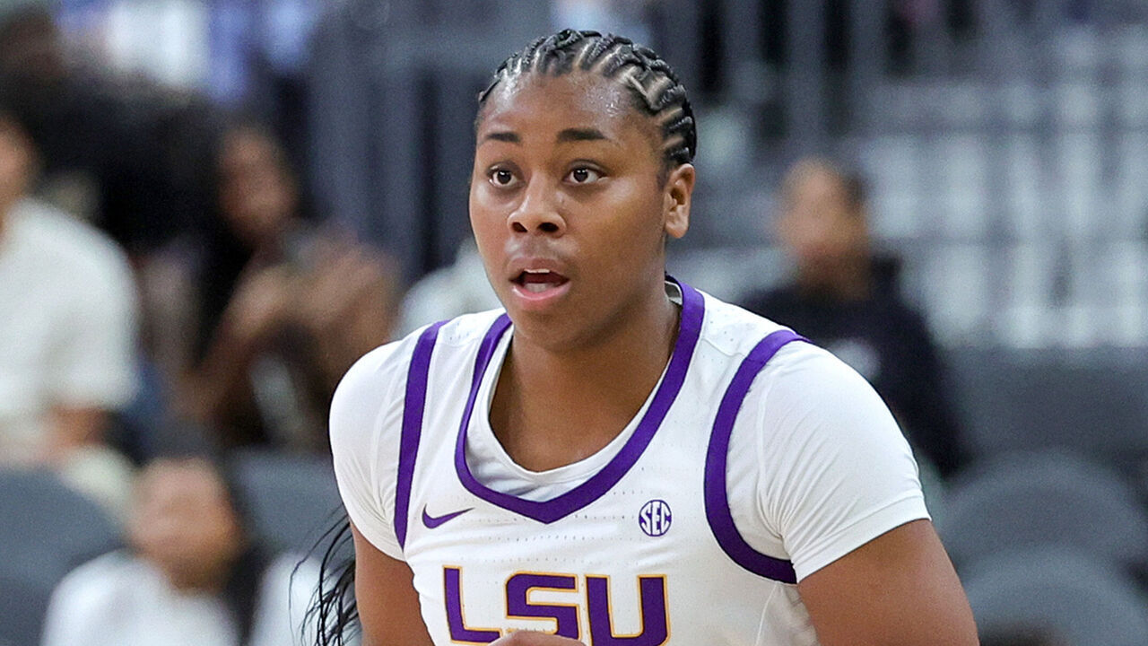 LAS VEGAS, NEVADA - NOVEMBER 06: Mikaylah Williams #12 of the LSU Lady Tigers brings the ball up the court against the Colorado Buffaloes in the second half of their game during the Naismith Basketball Hall of Fame Series at T-Mobile Arena on November 06, 2023 in Las Vegas, Nevada. The Buffaloes defeated the Lady Tigers 92-78.
