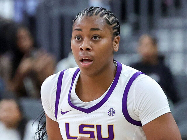 LAS VEGAS, NEVADA - NOVEMBER 06: Mikaylah Williams #12 of the LSU Lady Tigers brings the ball up the court against the Colorado Buffaloes in the second half of their game during the Naismith Basketball Hall of Fame Series at T-Mobile Arena on November 06, 2023 in Las Vegas, Nevada. The Buffaloes defeated the Lady Tigers 92-78.