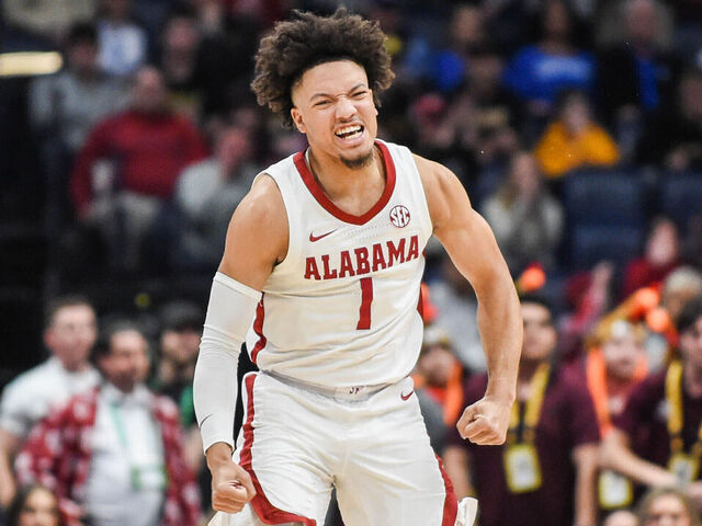 NASHVILLE, TENNESSEE - MARCH 12: Mark Sears #1 of the Alabama Crimson Tide reacts to scoring a three point basket against the Texas A&M Aggies in the first half during the finals of the 2023 SEC Men's Basketball Tournament at Bridgestone Arena on March 12, 2023 in Nashville, Tennessee.