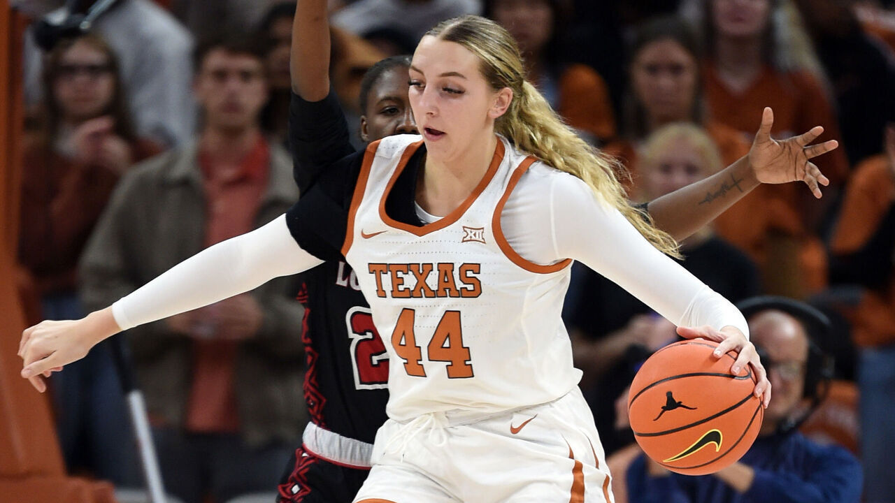 AUSTIN, TX - NOVEMBER 11: Texas Longhorns center Taylor Jones (44) moves the ball downcourt during game featuring the Louisiana Ragin Cajuns and Texas Longhorns on November 11, 2022, at the Moody Center in Austin, TX.