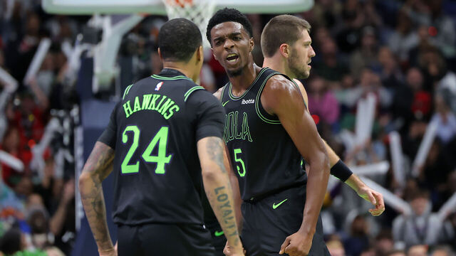 NEW ORLEANS, LOUISIANA - NOVEMBER 14: Herbert Jones #5 and Jordan Hawkins #24 of the New Orleans Pelicans celebrate during the first half of the the NBA In-Season Tournament against the Dallas Mavericks at the Smoothie King Center on November 14, 2023 in New Orleans, Louisiana.