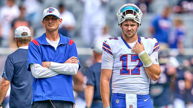 CHICAGO, IL - AUGUST 21: Buffalo Bills quarterbacks coach Ken Dorsey and quarterback Josh Allen (17) look on during a preseason game between the Chicago Bears and the Buffalo Bills on August 21, 2021 at Soldier Field in Chicago, IL.