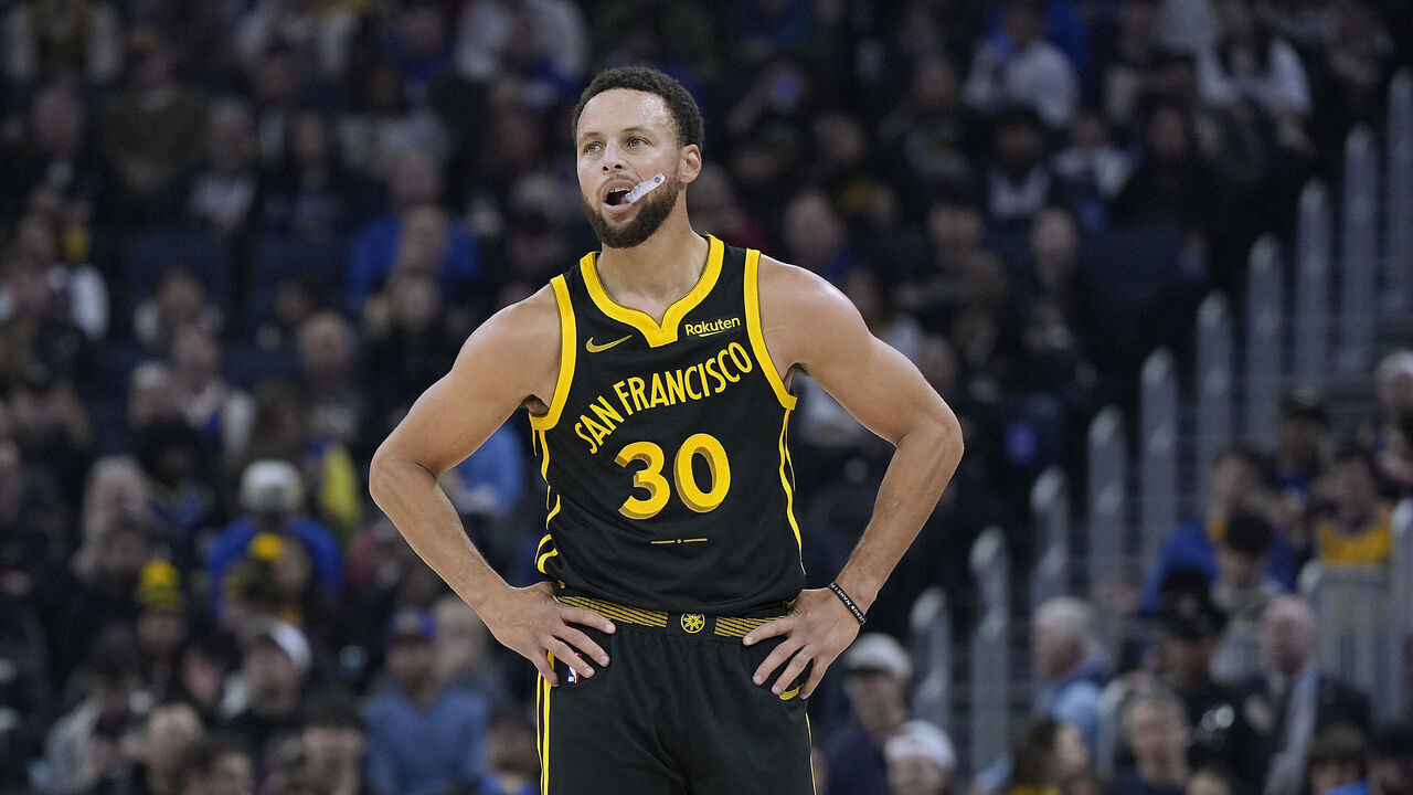SAN FRANCISCO, CALIFORNIA - NOVEMBER 12: Stephen Curry #30 of the Golden State Warriors looks on against the Minnesota Timberwolves during the first half of an NBA basketball game at Chase Center on November 12, 2023 in San Francisco, California.