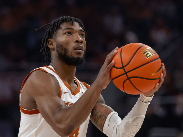 AUSTIN, TX - NOVEMBER 06: Texas Longhorns guard Tyrese Hunter (4) takes a free throw during the college basketball game between Texas Longhorns and Incarnate Word Cardinals on November 6, 2023, at Moody Center in Austin, TX.