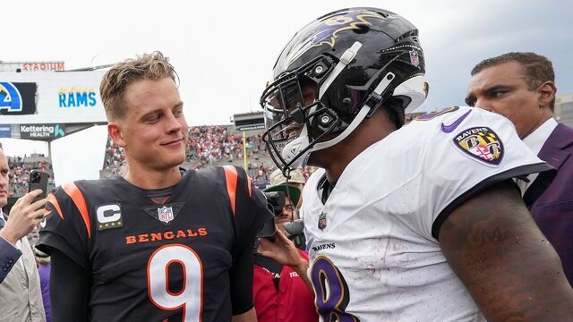 CINCINNATI, OHIO - SEPTEMBER 17: Joe Burrow #9 of the Cincinnati Bengals and Lamar Jackson #8 of the Baltimore Ravens meet after the Ravens beat the Bengals 27-24 at Paycor Stadium on September 17, 2023 in Cincinnati, Ohio.