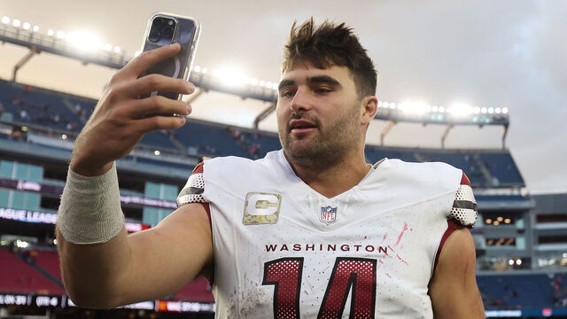 FOXBOROUGH, MASSACHUSETTS - NOVEMBER 05: Sam Howell #14 of the Washington Commanders walks off the field after defeating the New England Patriots at Gillette Stadium on November 05, 2023 in Foxborough, Massachusetts.