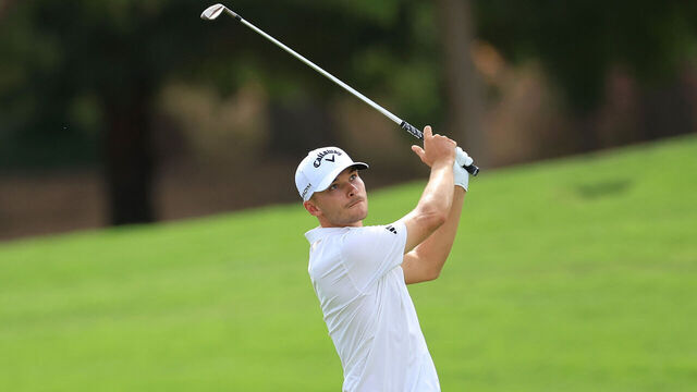 DUBAI, UNITED ARAB EMIRATES - NOVEMBER 16: Nicolai Hojgaard of Denmark plays his second shot on the third hole during the first round on Day One of the DP World Tour Championship on the Earth Course at Jumeirah Golf Estates on November 16, 2023 in Dubai, United Arab Emirates.