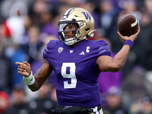 SEATTLE, WASHINGTON - NOVEMBER 11: Michael Penix Jr. #9 of the Washington Huskies passes against the Utah Utes during the second quarter at Husky Stadium on November 11, 2023 in Seattle, Washington.