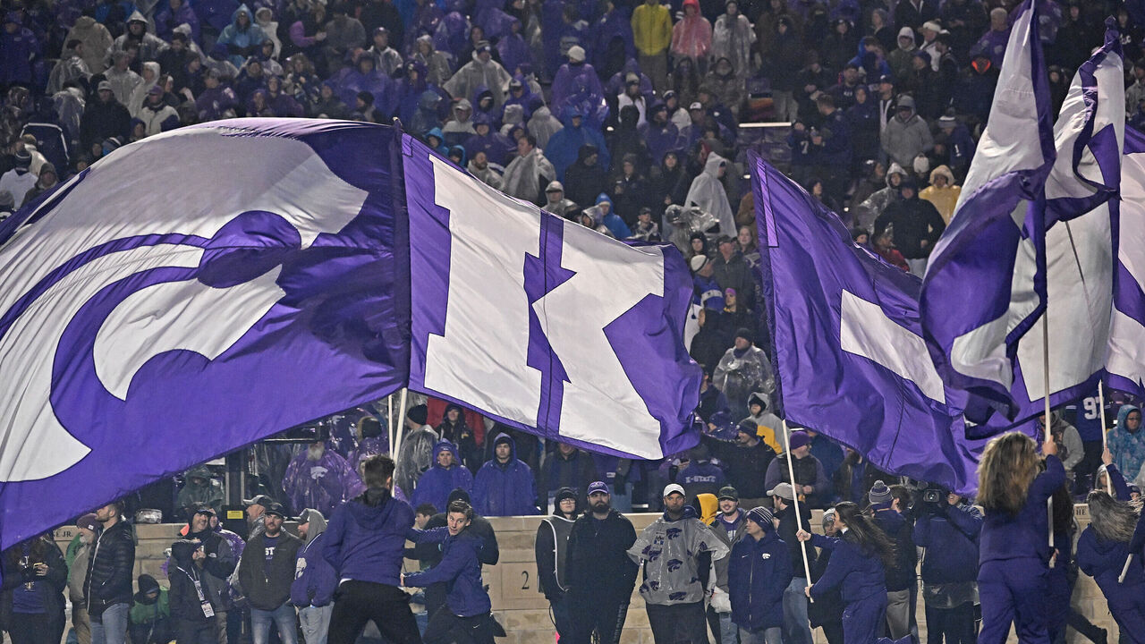 MANHATTAN, KS - NOVEMBER 26: Kansas State Wildcats cheerleader after a Wildcats touchdown during the second half against the Kansas Jayhawks at Bill Snyder Family Football Stadium on November 26, 2022 in Manhattan, Kansas. *** Local Caption ***