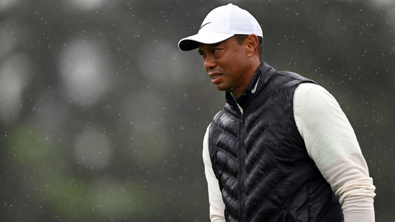 AUGUSTA, GEORGIA - APRIL 08: Tiger Woods of the United States looks on from the 18th green during the continuation of the weather delayed second round of the 2023 Masters Tournament at Augusta National Golf Club on April 08, 2023 in Augusta, Georgia.