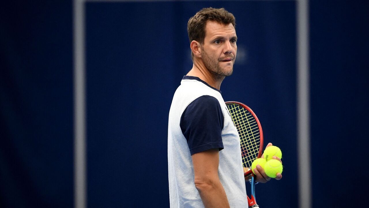 France's Paul-Henri Mathieu looks on a training session prior to the upcoming Davis Cup tournament in Germany, on September 9, 2022, in Paris. - The French Davis Cup team will play the group phase from September 14 to 18 in Hamburg.