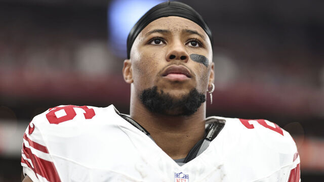 GLENDALE, ARIZONA - SEPTEMBER 17: Saquon Barkley #26 of the New York Giants looks on during the national anthem prior to an NFL football game between the Arizona Cardinals and the New York Giants at State Farm Stadium on September 17, 2023 in Glendale, Arizona.