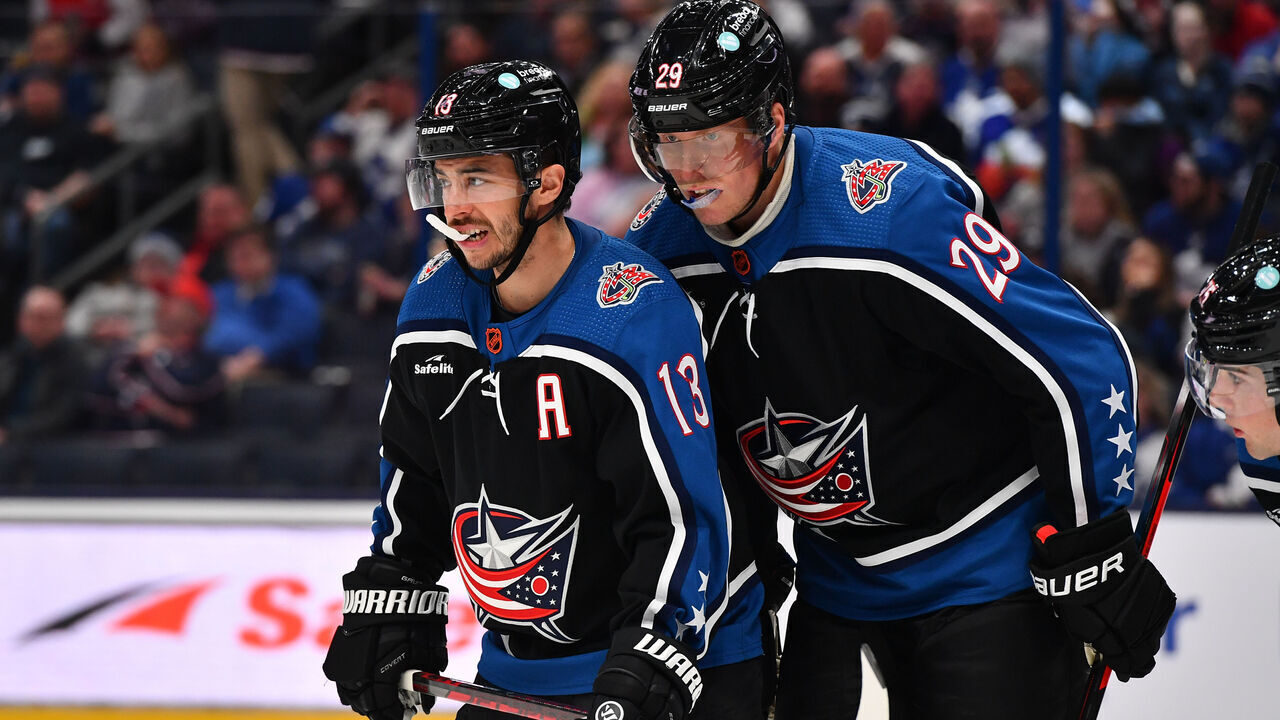 COLUMBUS, OHIO - FEBRUARY 10: Patrik Laine #29 talks with teammate Johnny Gaudreau #13 of the Columbus Blue Jackets prior to a face-off during the second period of a game against the Toronto Maple Leafs at Nationwide Arena on February 10, 2023 in Columbus, Ohio.
