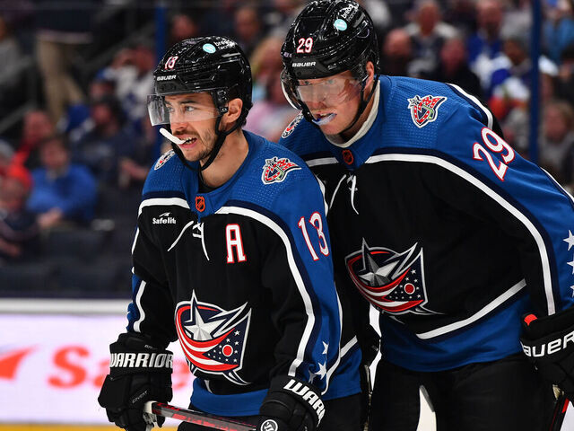 COLUMBUS, OHIO - FEBRUARY 10: Patrik Laine #29 talks with teammate Johnny Gaudreau #13 of the Columbus Blue Jackets prior to a face-off during the second period of a game against the Toronto Maple Leafs at Nationwide Arena on February 10, 2023 in Columbus, Ohio.