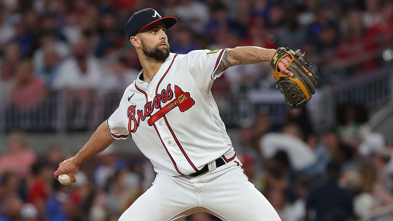 ATLANTA, GEORGIA - MAY 25: Nick Anderson #61 of the Atlanta Braves pitches in the eighth inning against the Philadelphia Phillies at Truist Park on May 25, 2023 in Atlanta, Georgia.