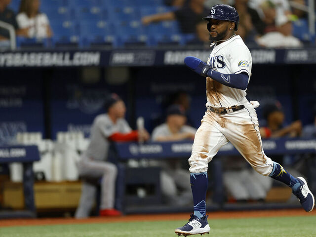 ST PETERSBURG, FLORIDA - SEPTEMBER 05: Vidal Brujan #7 of the Tampa Bay Rays scores a run in the scond inning during a game against the Boston Red Sox at Tropicana Field on September 05, 2023 in St Petersburg, Florida.