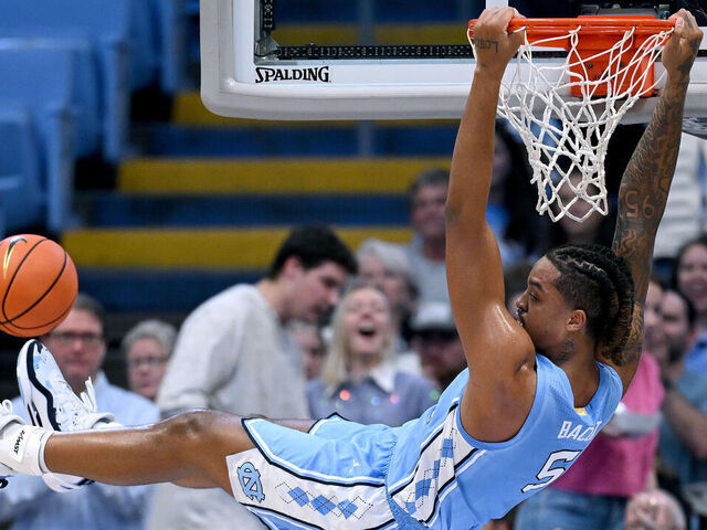 CHAPEL HILL, NORTH CAROLINA - NOVEMBER 17: Armando Bacot #5 of the North Carolina Tar Heels dunks against the UC Riverside Highlanders during the first half of the game at the Dean E. Smith Center on November 17, 2023 in Chapel Hill, North Carolina.