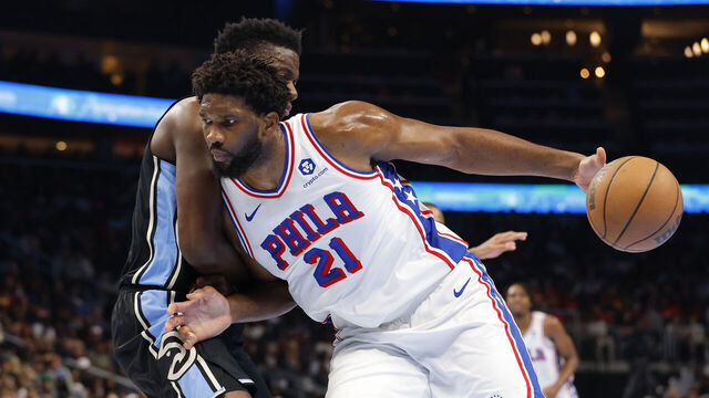 ATLANTA, GEORGIA - NOVEMBER 17: Joel Embiid #21 of the Philadelphia 76ers drives against Clint Capela #15 of the Atlanta Hawks during the second quarter of an NBA In-Season Tournament game at State Farm Arena on November 17, 2023 in Atlanta, Georgia.