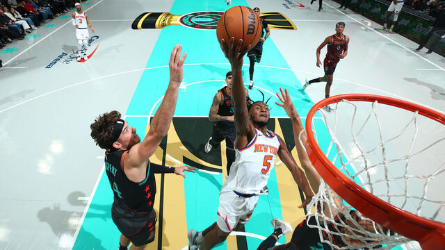 WASHINGTON, DC - NOVEMBER 17: Immanuel Quickley #5 of the New York Knicks drives to the basket during the game against the Washington Wizards during the In-Season Tournament on November 17, 2023 at Capital One Arena in Washington, DC. Mandatory Copyright Notice: Copyright 2023 NBAE