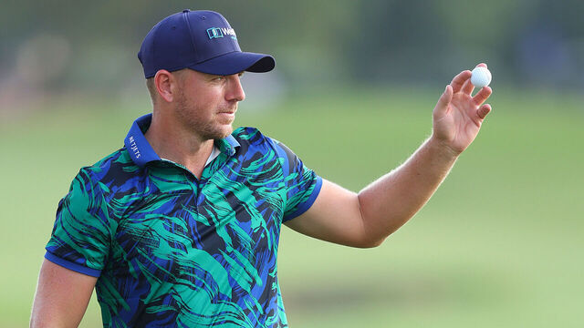 DUBAI, UNITED ARAB EMIRATES - NOVEMBER 18: Matt Wallace of England acknowledges the crowd on the 18th green during Day Three of the DP World Tour Championship on the Earth Course at Jumeirah Golf Estates on November 18, 2023 in Dubai, United Arab Emirates.