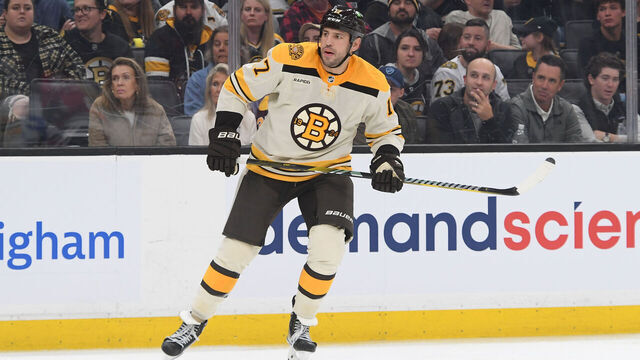 BOSTON, MASSACHUSETTS - OCTOBER 11: Milan Lucic #17 of the Boston Bruins skates against the Chicago Blackhawks in the season opener on October 11, 2023 at the TD Garden in Boston, Massachusetts.