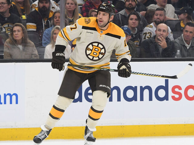 BOSTON, MASSACHUSETTS - OCTOBER 11: Milan Lucic #17 of the Boston Bruins skates against the Chicago Blackhawks in the season opener on October 11, 2023 at the TD Garden in Boston, Massachusetts.