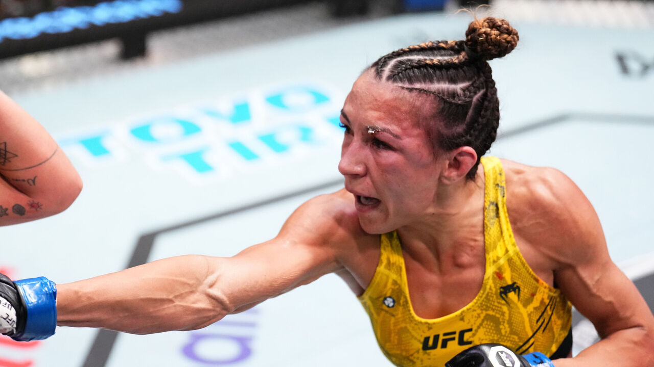 LAS VEGAS, NEVADA - NOVEMBER 18: (R-L) Amanda Ribas of Brazil punches Luana Pinheiro of Brazil in a strawweight fight during the UFC Fight Night event at UFC APEX on November 18, 2023 in Las Vegas, Nevada.