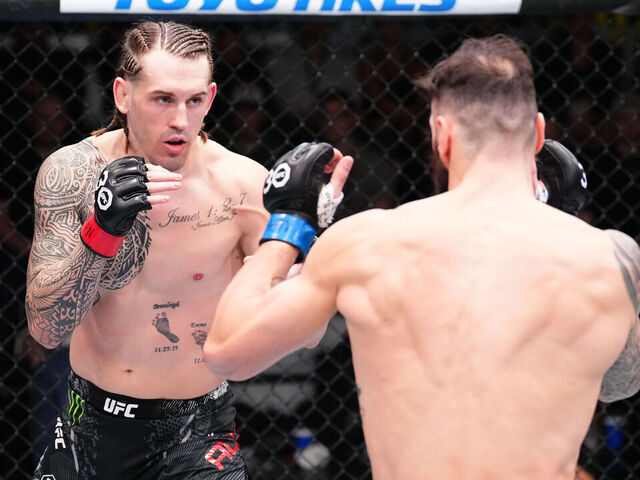 LAS VEGAS, NEVADA - NOVEMBER 18: (L-R) Brendan Allen battles Paul Craig of Scotland in a middleweight fight during the UFC Fight Night event at UFC APEX on November 18, 2023 in Las Vegas, Nevada.