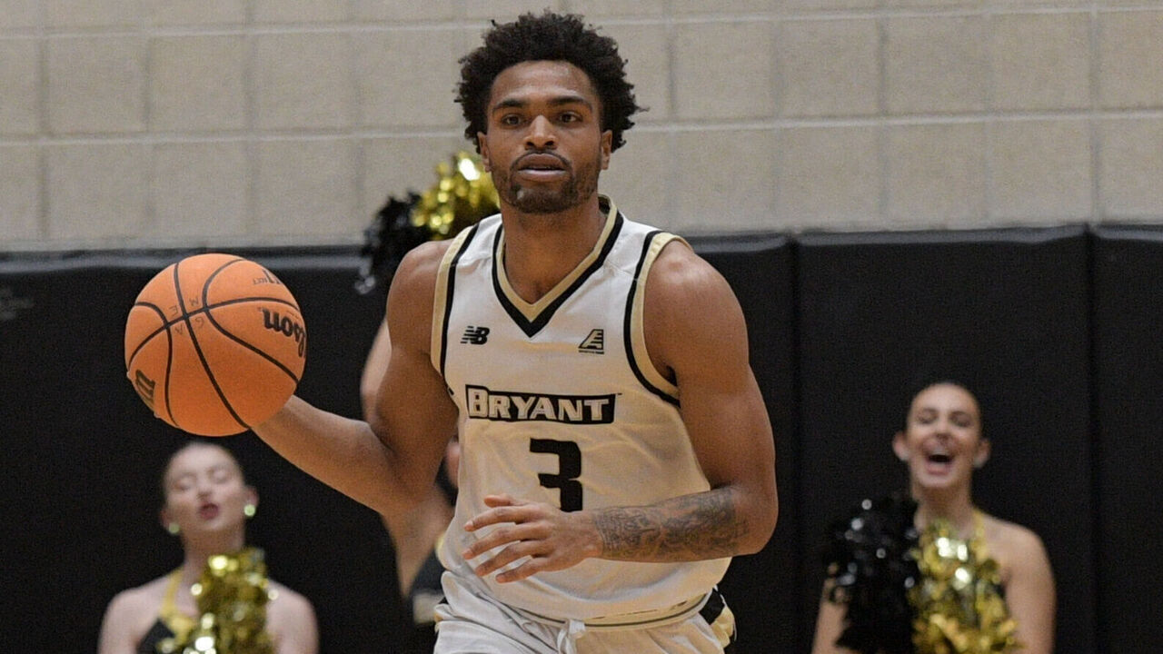 SMITHFIELD, RI - DECEMBER 02: Bryant Bulldogs guard Sherif Gross-Bullock (3) brings the ball up the court during a college basketball game between the Brown Bears and the Bryant Bulldogs on December 2, 2022, at Chace Athletic Center in Smithfield, RI.