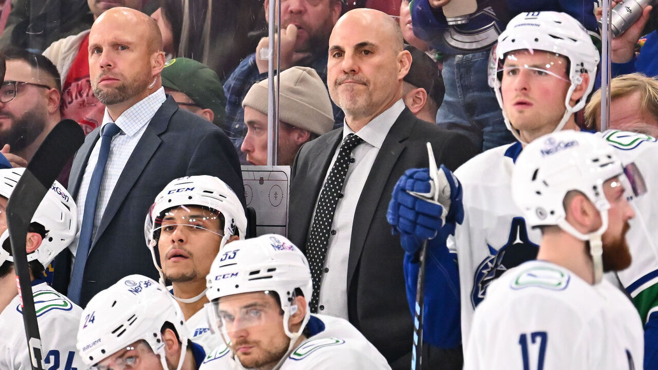 MONTREAL, CANADA - NOVEMBER 12: (L-R) Assistant coach, Mike Yeo and head coach of the Vancouver Canucks, Rick Tocchet, handle bench duties during the second period against the Montreal Canadiens at the Bell Centre on November 12, 2023 in Montreal, Quebec, Canada. The Vancouver Canucks defeated the Montreal Canadiens 5-2.