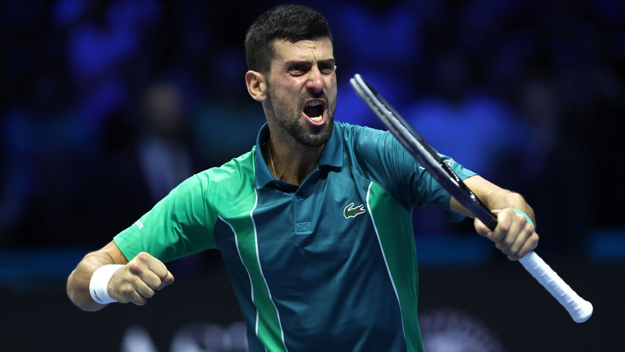 TURIN, ITALY - NOVEMBER 19: Novak Djokovic of Serbia celebrates winning match point against Jannik Sinner of Italy in the Men's Singles Finals between Jannik Sinner of Italy and Novak Djokovic of Serbia on day eight of the Nitto ATP Finals at Pala Alpitour on November 19, 2023 in Turin, Italy.