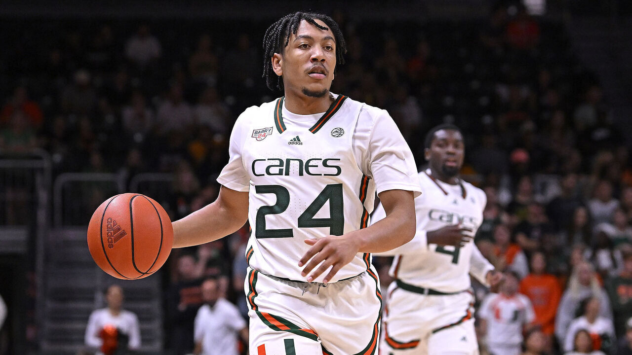 CORAL GABLES, FL - NOVEMBER 13: Miami guard Nijel Pack (24) handles the ball in the first half as the Miami Hurricanes faced the FIU Panthers on November 13, 2023, at the Watsco Center in Coral Gables, Florida.