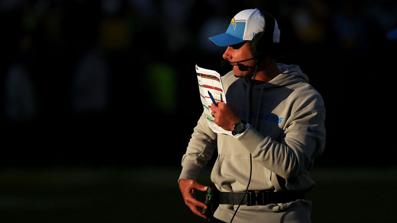 GREEN BAY, WISCONSIN - NOVEMBER 19: Head coach Brandon Staley of the Los Angeles Chargers calls a play in the fourth quarter against the Green Bay Packers at Lambeau Field on November 19, 2023 in Green Bay, Wisconsin.