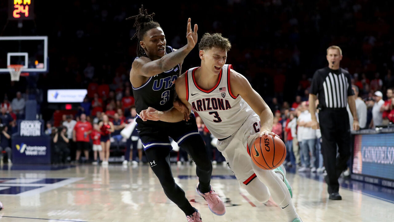 TUCSON, AZ - NOVEMBER 19: Texas-Arlington Mavericks guard DaJuan Gordon #3 guards Arizona Wildcats guard Pelle Larsson #3 during the first half of a men's basketball game between the UT Arlington Mavericks and the University of Arizona Wildcats on November 19, 2023 at McKale Center in Tucson, AZ.