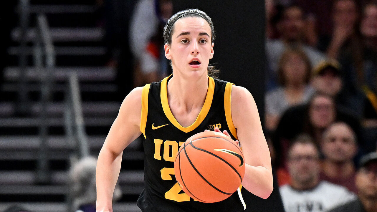 CHARLOTTE, NORTH CAROLINA - NOVEMBER 09: Caitlin Clark #22 of the Iowa Hawkeyes handles the ball against the Virginia Tech Hokies at Spectrum Center on November 09, 2023 in Charlotte, North Carolina.