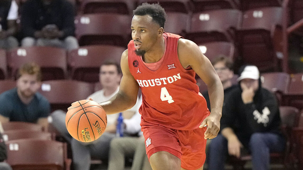 CHARLESTON, SC - NOVEMBER 16: LJ Cryer #4 of the Houston Cougars dribbles up court in the second half during day one of the Shriners Children's Charleston Classic college basketball game against the Houston Cougars at the TD Arena on November 16, 2023 in Charleston, South Carolina.
