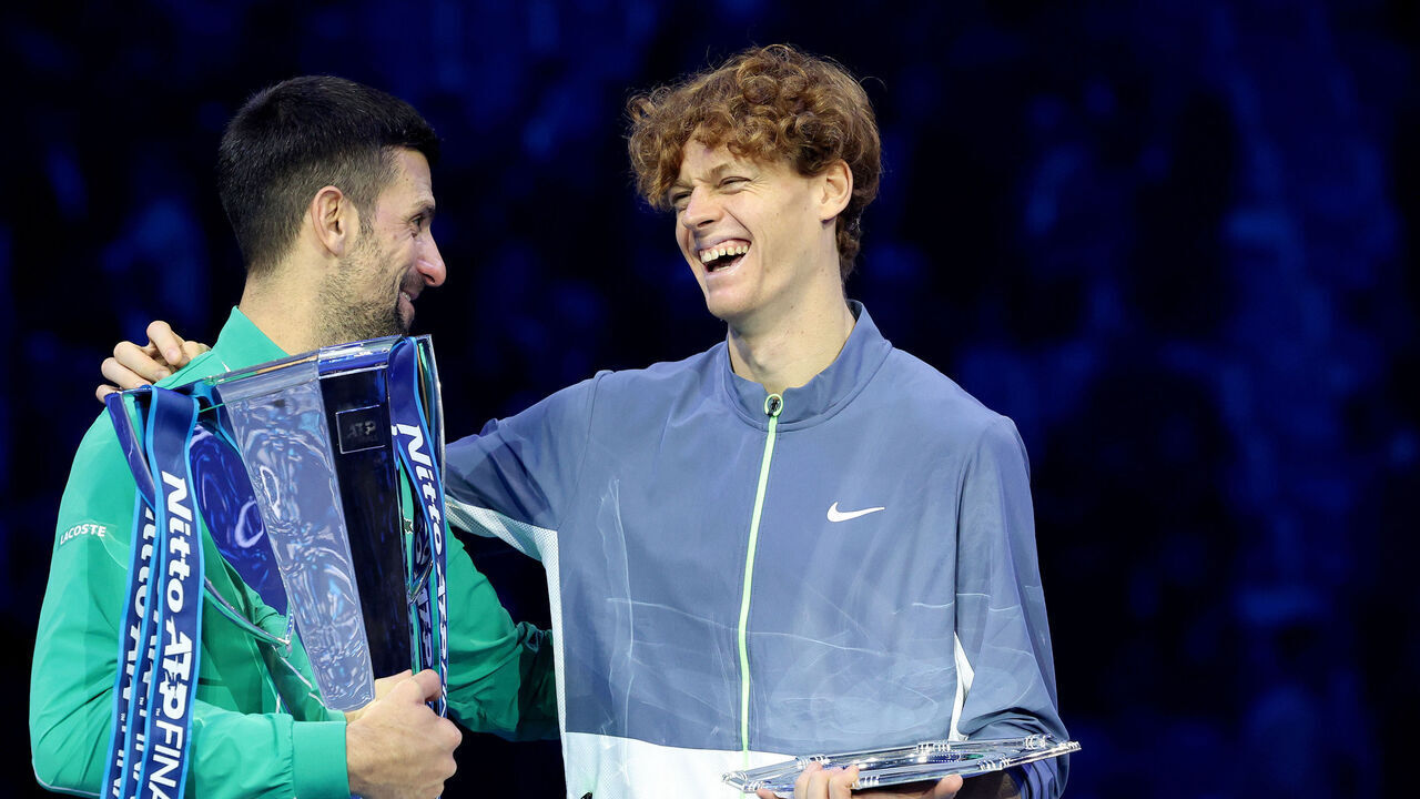 TURIN, ITALY - NOVEMBER 19: TURIN, ITALY - NOVEMBER 19: Novak Djokovic (L) of Serbia and Jannik Sinner of Italy react following the Men's Singles Finals between Jannik Sinner of Italy and Novak Djokovic of Serbia on day eight of the Nitto ATP Finals at Pala Alpitour on November 19, 2023 in Turin, Italy.