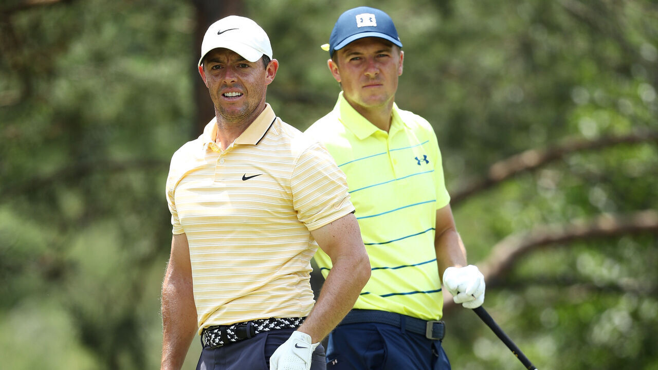 DUBLIN, OHIO - JULY 19: Rory McIlroy of Northern Ireland and Jordan Spieth of the United States look on from the second tee during the final round of The Memorial Tournament on July 19, 2020 at Muirfield Village Golf Club in Dublin, Ohio.