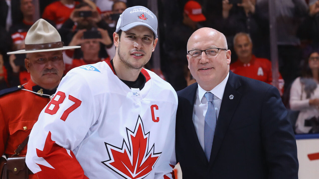 TORONTO, ON - SEPTEMBER 29: Sidney Crosby #87 of Team Canada is awarded the World Cup of Hockey MVP trophy by Bill Daly following a 2-1 victory over Team Canada at the Air Canada Centre on September 29, 2016 in Toronto, Canada.