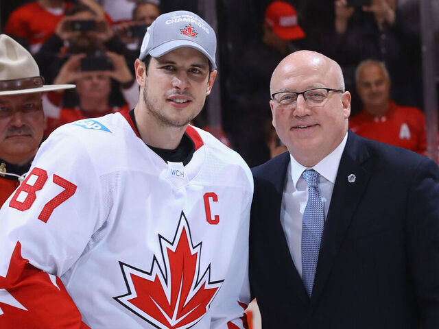 TORONTO, ON - SEPTEMBER 29: Sidney Crosby #87 of Team Canada is awarded the World Cup of Hockey MVP trophy by Bill Daly following a 2-1 victory over Team Canada at the Air Canada Centre on September 29, 2016 in Toronto, Canada.