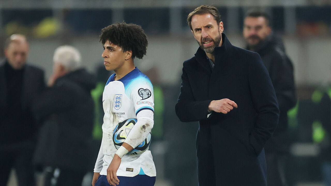 SKOPJE, MACEDONIA - NOVEMBER 20: Gareth Southgate, Head Coach of England, speaks with Rico Lewis during the UEFA EURO 2024 European qualifier match between North Macedonia and England at National Arena Todor Proeski on November 20, 2023 in Skopje, Macedonia.