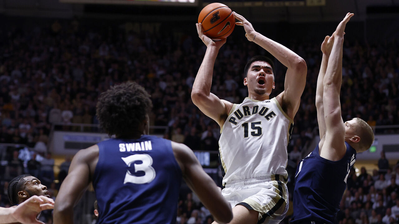 WEST LAFAYETTE, IN - NOVEMBER 13: Purdue Boilermakers center Zach Edey (15) goes up with his shot over Xavier Musketeers forward Sasa Ciani (21) in the fist half of play during a mens college basketball game between the Xavier Musketeers and the Purdue Boilermakers on November 13, 2023 at Mackey Arena in West Lafayette, IN.