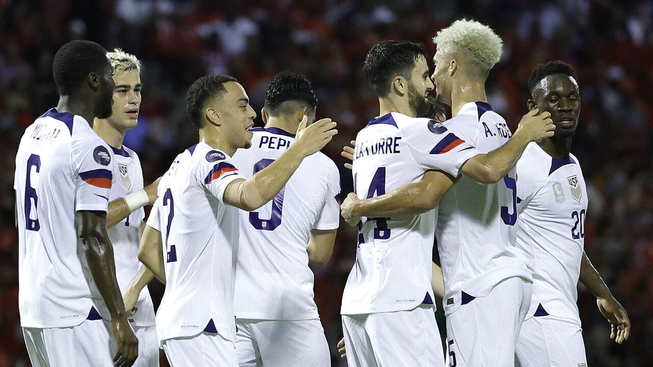 PORT OF SPAIN, TRINIDAD AND TOBAGO - NOVEMBER 20: Antonee Robinson #5 of the United States celebrates scoring with teammates during the first half against Trinidad and Tobago at Hasely Crawford Stadium on November 20, 2023 in Port of Spain, Trinidad And Tobago.