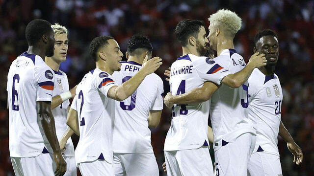 PORT OF SPAIN, TRINIDAD AND TOBAGO - NOVEMBER 20: Antonee Robinson #5 of the United States celebrates scoring with teammates during the first half against Trinidad and Tobago at Hasely Crawford Stadium on November 20, 2023 in Port of Spain, Trinidad And Tobago.