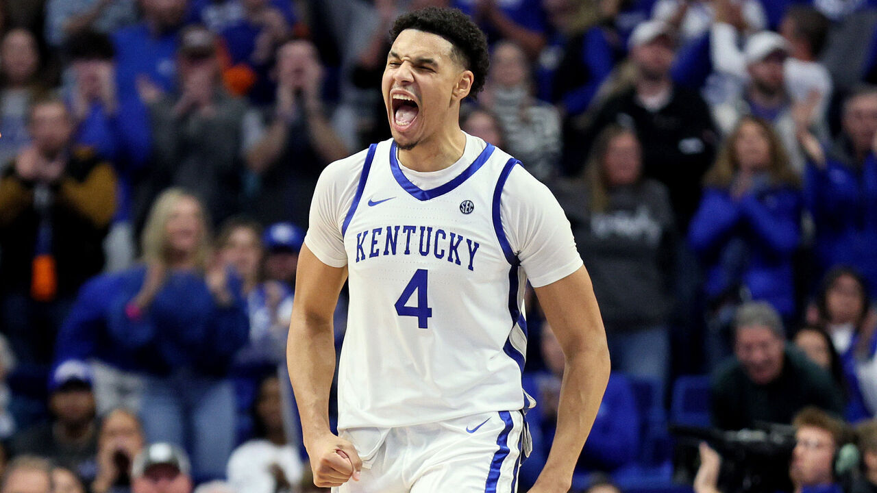 LEXINGTON, KENTUCKY - NOVEMBER 20: Tre Mitchell #4 of the Kentucky Wildcats celebrates during the 96-88 OT win against the Saint Joseph's Hawks at Rupp Arena on November 20, 2023 in Lexington, Kentucky.