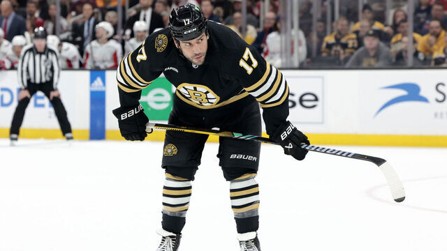 BOSTON, MA - OCTOBER 03: Boston Bruins left wing Milan Lucic (17) checks the defense out during a game between the Boston Bruins and the Washington Capitals on October 3, 2023, at TD Garden in Boston, Massachusetts.