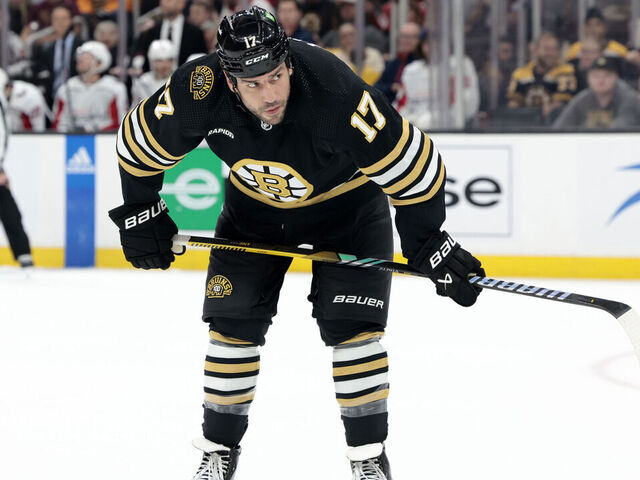 BOSTON, MA - OCTOBER 03: Boston Bruins left wing Milan Lucic (17) checks the defense out during a game between the Boston Bruins and the Washington Capitals on October 3, 2023, at TD Garden in Boston, Massachusetts.